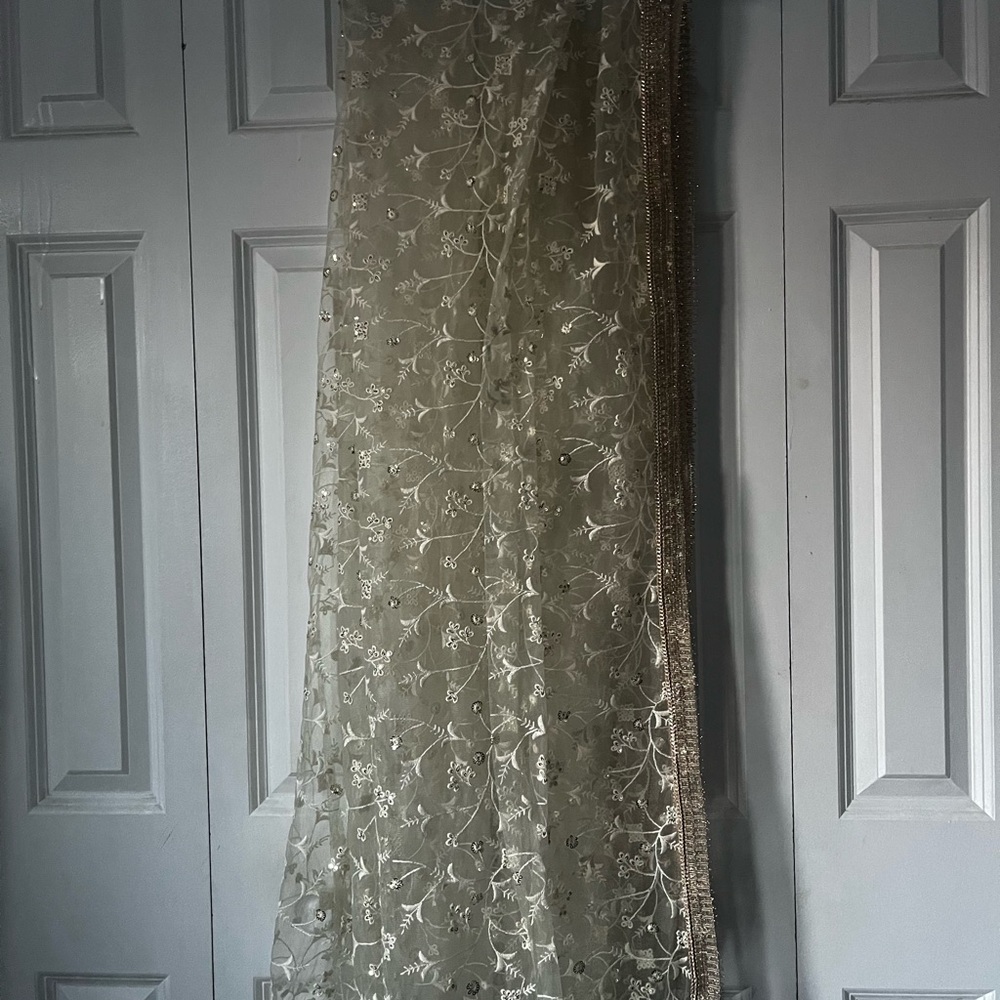 Turquoise Net Embroidered Lehenga Choli - Picture 7 of 9